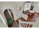 Open foyer with stairs and dining room, showcasing the home's inviting layout and hardwood floors at 2018 Cornell Ave, Indianapolis, IN 46202