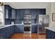 Beautiful kitchen with stainless steel appliances and plenty of cabinet and counter space at 2018 Cornell Ave, Indianapolis, IN 46202