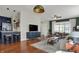 Inviting living room with hardwood floors, modern furnishings, and abundant natural light at 2018 Cornell Ave, Indianapolis, IN 46202