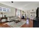Bright and airy living room with hardwood floors, comfortable seating, and tasteful decor at 2018 Cornell Ave, Indianapolis, IN 46202
