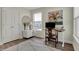 Bright office space with neutral walls, a modern desk, artwork, and sleek flooring at 2018 Cornell Ave, Indianapolis, IN 46202