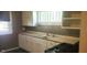 Practical kitchen with abundant counter space and storage options at 213 S Brittain Ave, Muncie, IN 47303