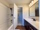 Bathroom with a black shower head, framed mirror, and white vanity with a white countertop at 2328 Discovery Dr, Anderson, IN 46017