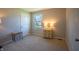 Bright bedroom with carpet flooring, natural light, and a classic three drawer dresser at 2328 Discovery Dr, Anderson, IN 46017