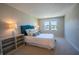 Cozy bedroom featuring a bright window, plush carpet, and neutral paint at 2328 Discovery Dr, Anderson, IN 46017