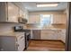 Modern kitchen with white cabinets and stainless steel appliances at 2328 Discovery Dr, Anderson, IN 46017