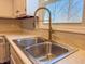Close-up of a kitchen sink with brushed metal faucet at 2328 Discovery Dr, Anderson, IN 46017