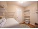 Bright laundry room with washer, dryer, shelving and a door with glass panes at 2328 Discovery Dr, Anderson, IN 46017