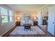 Cozy living room featuring a comfortable sofa, stylish rug, and an open doorway at 2328 Discovery Dr, Anderson, IN 46017
