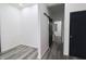 Hallway with fresh paint, leading to other rooms in home at 249 E Minnesota St, Indianapolis, IN 46225