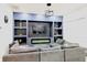 Modern living room boasts a sleek entertainment center with fireplace and comfortable seating at 249 E Minnesota St, Indianapolis, IN 46225