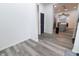 Open-concept living room with hard flooring and easy access to the kitchen at 249 E Minnesota St, Indianapolis, IN 46225