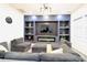 Cozy living room with a dark accent wall, contemporary lighting, and comfortable seating at 249 E Minnesota St, Indianapolis, IN 46225