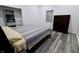 Spacious main bedroom features fresh paint and a new flooring at 249 E Minnesota St, Indianapolis, IN 46225