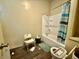 Well-lit bathroom, ready for renovation at 26 N Holmes Ave, Indianapolis, IN 46222