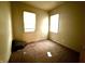 Bright bedroom with two large windows, offering plenty of natural light at 26 N Holmes Ave, Indianapolis, IN 46222