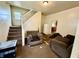 Comfortable living space with easy stairway access and good natural light at 26 N Holmes Ave, Indianapolis, IN 46222