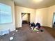 Open living area with stairway access, ideal for entertaining and relaxing at 26 N Holmes Ave, Indianapolis, IN 46222
