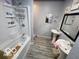 Updated bathroom featuring double sinks, modern fixtures, and a shower-tub combo at 2706 Country Estates Dr, Indianapolis, IN 46227