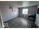 Spacious bedroom with large window offering plenty of natural light at 2706 Country Estates Dr, Indianapolis, IN 46227