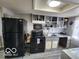 Functional kitchen with ample cabinet space, modern appliances, and practical layout at 2706 Country Estates Dr, Indianapolis, IN 46227