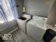 Practical laundry room with washer, dryer, and a functional layout at 2706 Country Estates Dr, Indianapolis, IN 46227