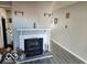 Cozy living room featuring a classic fireplace and modern flooring at 2706 Country Estates Dr, Indianapolis, IN 46227