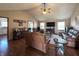 Spacious living room boasts hardwood floors, vaulted ceilings, comfortable seating, and plenty of natural light at 300 Kathryn Ct, Clayton, IN 46118