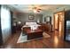 Cozy main bedroom offers a comfortable king bed and warm decor, perfect for relaxing after a long day at 300 Kathryn Ct, Clayton, IN 46118