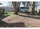Expansive backyard with mature trees, offering plenty of space for outdoor activities and gardening at 3438 Olive St, Indianapolis, IN 46227