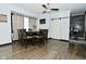 Bright dining room features modern ceiling fan and a barn door at 3438 Olive St, Indianapolis, IN 46227