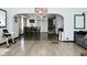 Spacious dining room features hardwood floors and stylish furnishings, perfect for entertaining at 3438 Olive St, Indianapolis, IN 46227