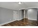 Cozy bedroom features hardwood floors, a neutral color scheme, and a closet for storage at 3484 Birchwood Ave, Indianapolis, IN 46205