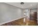 Spacious bedroom features hardwood floors, neutral paint, and a window for natural light and a closet at 3484 Birchwood Ave, Indianapolis, IN 46205