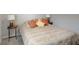 Comfortable bedroom with bed, decorative pillows, bedside tables, and matching lamps at 3799 Hoosier Down Dr, Bargersville, IN 46106