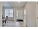 Hallway with entrance, dining space, and natural light at 3799 Hoosier Down Dr, Bargersville, IN 46106