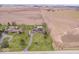 Expansive aerial view showcases a house with a private pool, surrounded by lush greenery and open fields at 4223 W State Road 234, McCordsville, IN 46055