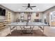Finished basement game room features ample seating, a custom bar, and a ping pong table at 4223 W State Road 234, McCordsville, IN 46055