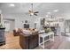 Bright and airy living room with a glimpse of the kitchen and dining area, perfect for modern living at 4223 W State Road 234, McCordsville, IN 46055
