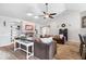 Spacious living room with vaulted ceiling, fireplace, stylish decor, and ample seating at 4223 W State Road 234, McCordsville, IN 46055