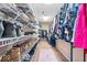 Functional walk-in closet with organized storage solutions for clothes and shoes at 4223 W State Road 234, McCordsville, IN 46055