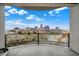 Balcony overlooking a stunning skyline view and featuring iron railings and a seating area at 435 Virginia Ave # 402, Indianapolis, IN 46203