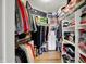 Walk-in closet with an organized shelving system, plenty of clothing racks, and ample storage space at 435 Virginia Ave # 402, Indianapolis, IN 46203