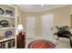 Inviting foyer decorated with a bright rug, classic furniture, and decorative dinnerware at 435 Virginia Ave # 402, Indianapolis, IN 46203