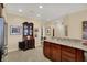 Bright kitchen with open layout, featuring granite countertops and stainless steel appliances at 435 Virginia Ave # 402, Indianapolis, IN 46203