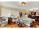 Cozy living room with hardwood floors, comfortable seating, and a glass coffee table at 435 Virginia Ave # 402, Indianapolis, IN 46203
