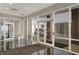 View of lobby with elevator and large window and door at 435 Virginia Ave # 402, Indianapolis, IN 46203