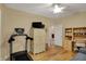 Functional spare room with a treadmill, cabinet, desk, and sleeper sofa, offering versatility at 435 Virginia Ave # 402, Indianapolis, IN 46203