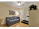 Cozy spare room with a sleeper sofa, closet, and treadmill, providing versatile use of space at 435 Virginia Ave # 402, Indianapolis, IN 46203