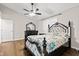 Bedroom with hardwood floors, ceiling fan and walk out porch at 448 Yorktown Ln, Avon, IN 46123